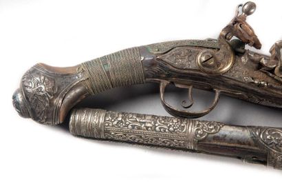 null An important pair of pistols, flintlock and flat-bodied, richly engraved in...