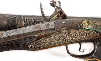 null An important pair of pistols, flintlock and flat-bodied, richly engraved in...