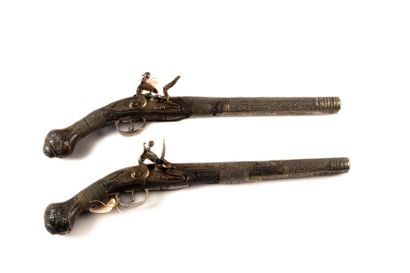 null An important pair of pistols, flintlock and flat-bodied, richly engraved in...