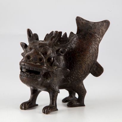 null CHINA

Bronze statuette with brown patina representing a stylized animal. 

H....