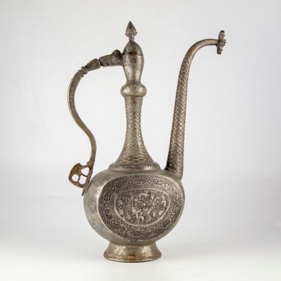 null In the Persian taste

Oriental copper ewer with finely chiselled decoration...