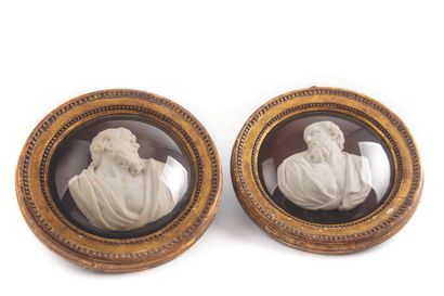 null Pair of marble medallions representing the Fathers of the Church

Gilded wood...