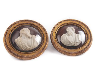 Pair of marble medallions representing the...