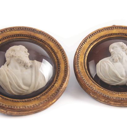 null Pair of marble medallions representing the Fathers of the Church

Gilded wood...