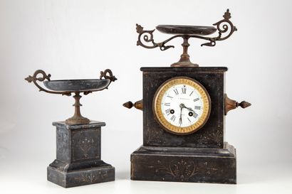 null Marble mantel set with a clock and a cup, engraved with stylized floral motifs

H....
