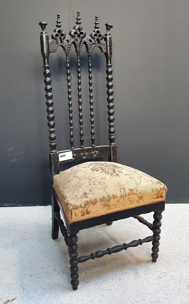 null Small blackened wooden chair with cathedral backrest with openwork turned bars.

H....
