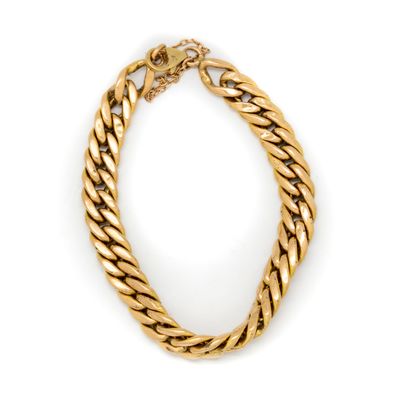 null Yellow gold bracelet with spike links and security chain

Weight: 10.7 g.