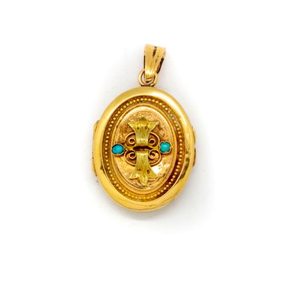 null Yellow gold pendant "Medallion of remembrance" punctuated with small turquoise...