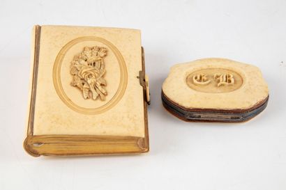 null Roman parish priest with carved ivory mount. A carved ivory-mounted wallet is...