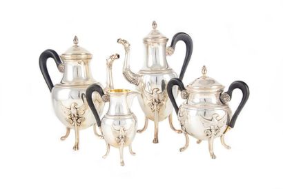 null Silver tea and coffee set moulded with palmette friezes and chiselled on the...