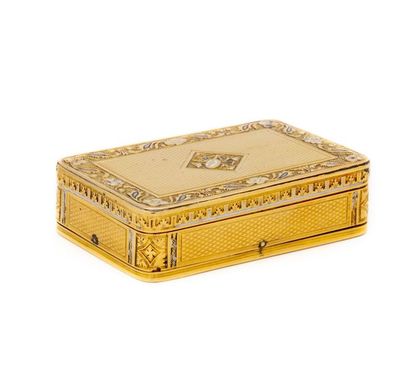 null Rectangular-shaped pill box in yellow gold and polychrome enamels. The lid with...