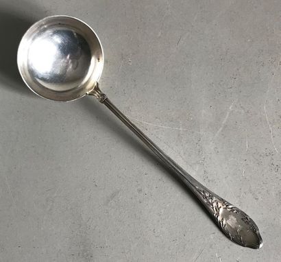 null Beautiful silver ladle molded with double fillets and chiselled with laurel...