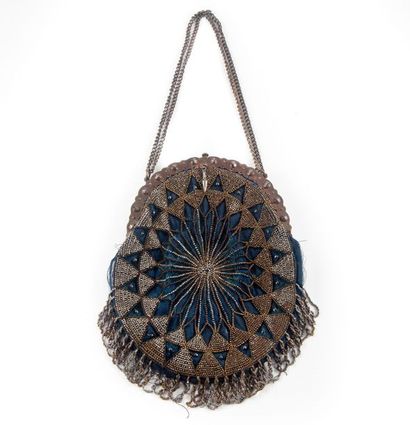 null Bag in the shape of a silk purse embroidered with pearls forming a radiant pattern....