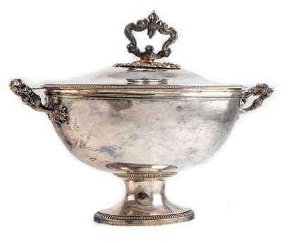 null An important shuttle-shaped tureen on a plain silver pedestal with a chased...