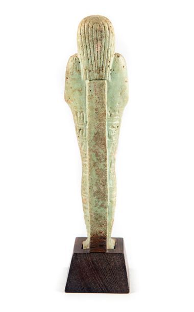 Oushebti Oushebti tardif - on joint son socle en bois
XXXe Dynastie
H. : 21,5 cm