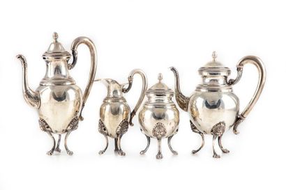 null Silver tea and coffee set with a moulded border of heart stripes. Each piece...