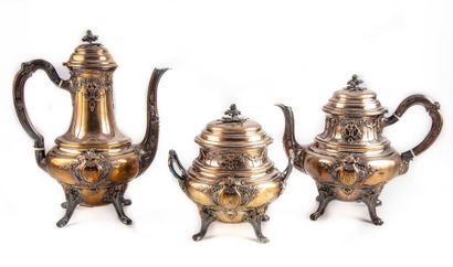 null Silver tea and coffee service richly chiselled with foliated scrolls, shells...