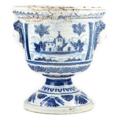 NEVERS NEVERS 
Important planter on foot in enamelled earthenware with blue-white...
