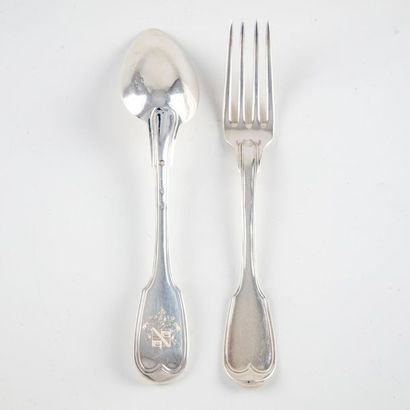 null Set of twelve large silver table cutlery moulded with fillets and contours....