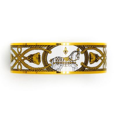 HERMES HERMES - Paris
Bracelet rigide 'Grand Apparat' en métal doré et décor émaillé...