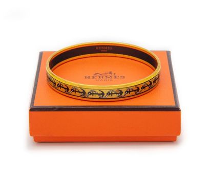 HERMES HERMES - Paris
Gilded metal and enamel bracelet with anchor chain motif
In...