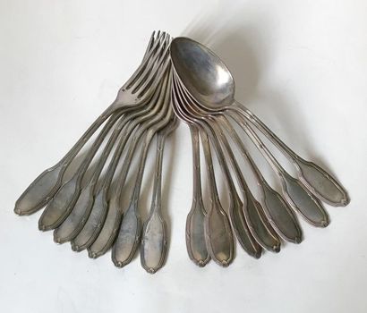 null A suite of eleven large silver-plated metal cutlery sets chiselled with a Louis...