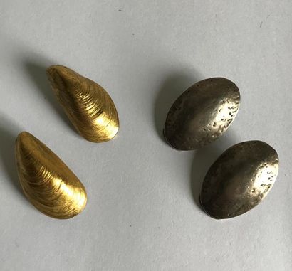 null Two pairs of pebble and moulded metal earrings. Circa 1950