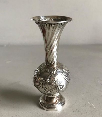 null Small silver baluster vase decorated with flowers and rockery
Minerva hallmark...