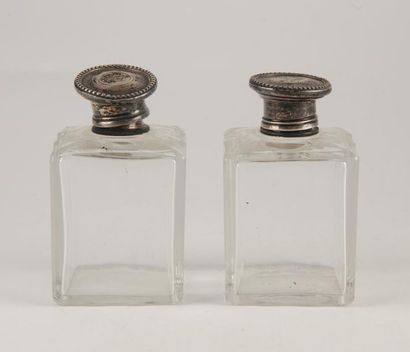 null Two glass travel flasks with silver metal stoppers ( accidents )