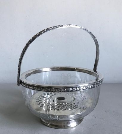 null Round crystal bowl with engraved decoration of garlands and ribbons. Silvered...