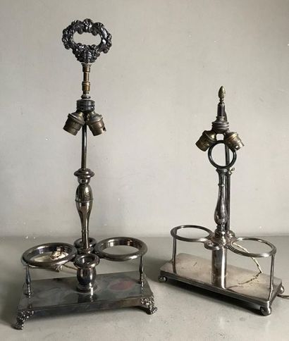 null Two silver plated metal oil holders with a rectangular base transformed into...