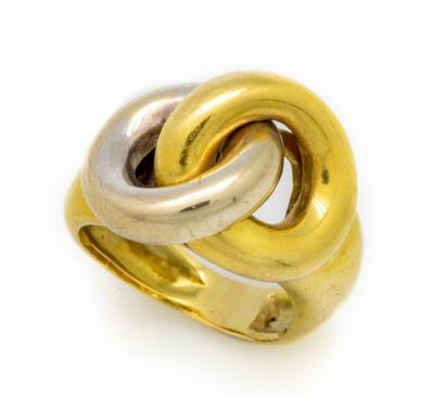 null Yellow and white gold ring forming an interlaced knot. 
TDD: 44,5
Weight: 7,3...