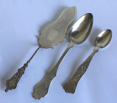 null Two foreign silver spoons and a small silver cake shovel in mind. 
