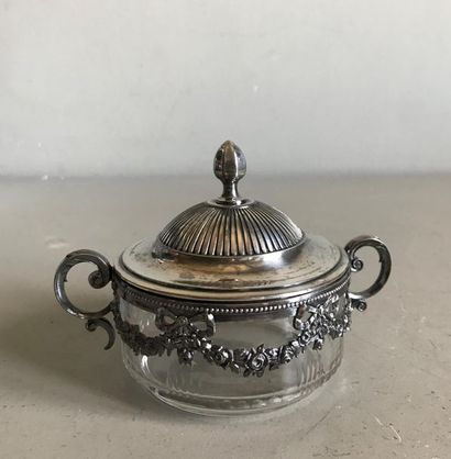 null Glass sugar bowl with silver metal frame and lid chiselled with garlands of...