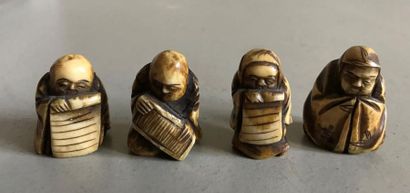 null JAPAN
Four Netsuke in patinated ivory representing small characters
Early 20th...