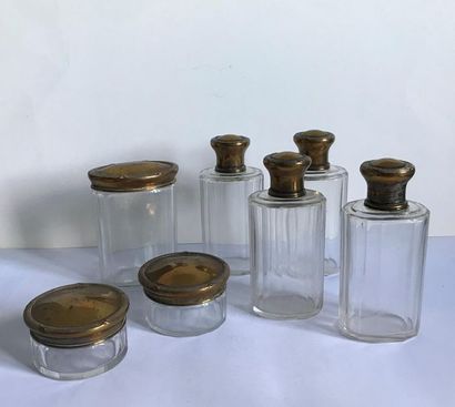 null Set of Louis XVI style glass toilet flasks and tins with metal stoppers (dis...