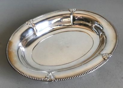 null Oval shaped bowl with pinched sides in silver plated metal molded with a frieze...