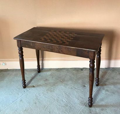 null Tric trac table in walnut and walnut veneer. Top inlaid with a checkerboard,...
