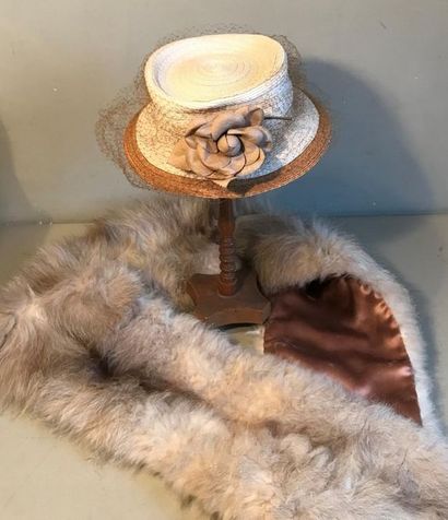 Fur stole and straw lady's hat. A lot of...