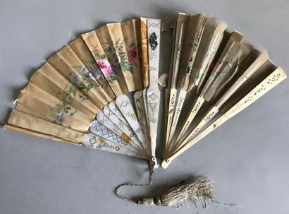null Two fans with strands in mother-of-pearl or openwork ivory and patina decorated...