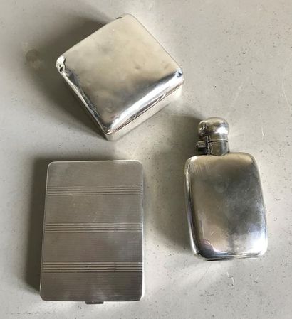 null Set consisting of: a cigarette box in English silver (shocks) - a silver metal...