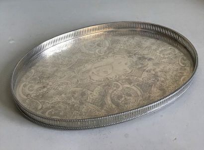 null Oval serving tray in silver plated metal with engraved decoration and openwork...