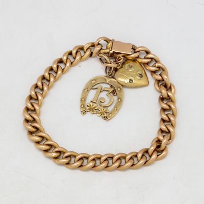 null Bracelet in yellow gold with 2 gold charms 

weight : 10,6 g