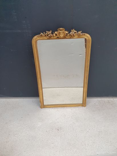 null Wood and gilded stucco mantel mirror with a pediment decorated with a cartouche...