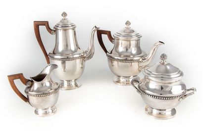 null Silver coffee and tea set including a coffee pot, a teapot, a sugar bowl, a...