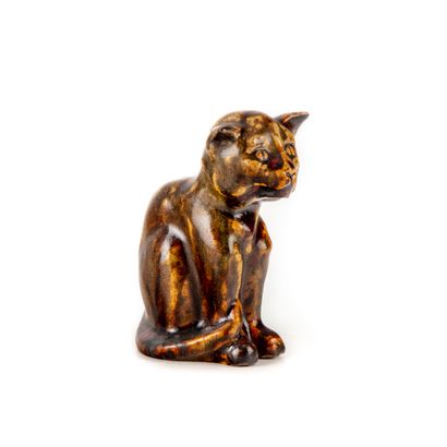 null Flamed stoneware cat

Circa 1900

H. 12 cm

(Small chip at the base)