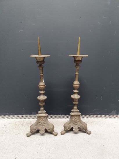 null A pair of large church candlesticks in moulded bronze in baluster and resting...