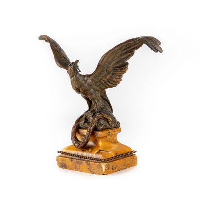 null Watch holder, the marble base, decorated with an eagle in regula with spread...