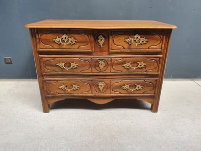 null Rectangular fruitwood chest of drawers opening with four moulded drawers on...