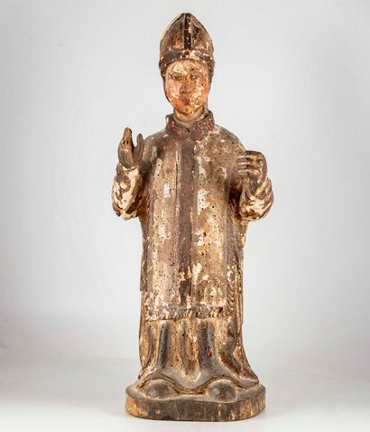null Carved wood bishop, traces of polychromy

18th century

H. 65 cm 

(Accidents...